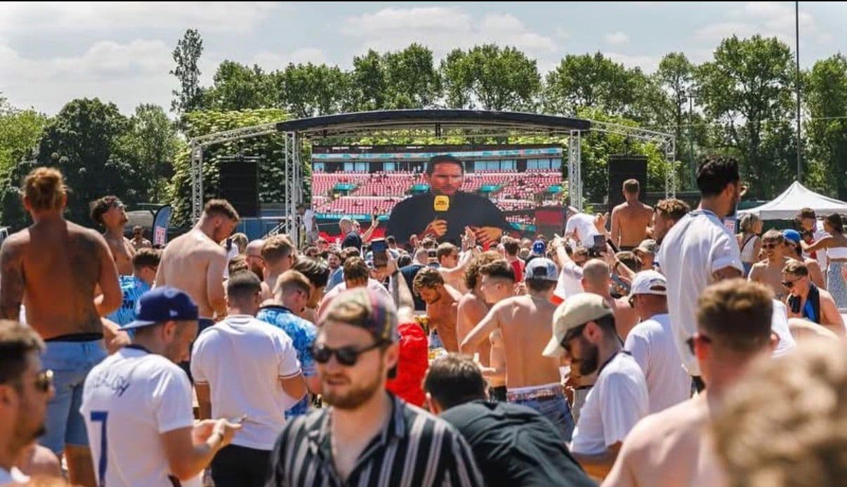 Crowd watching on big screen