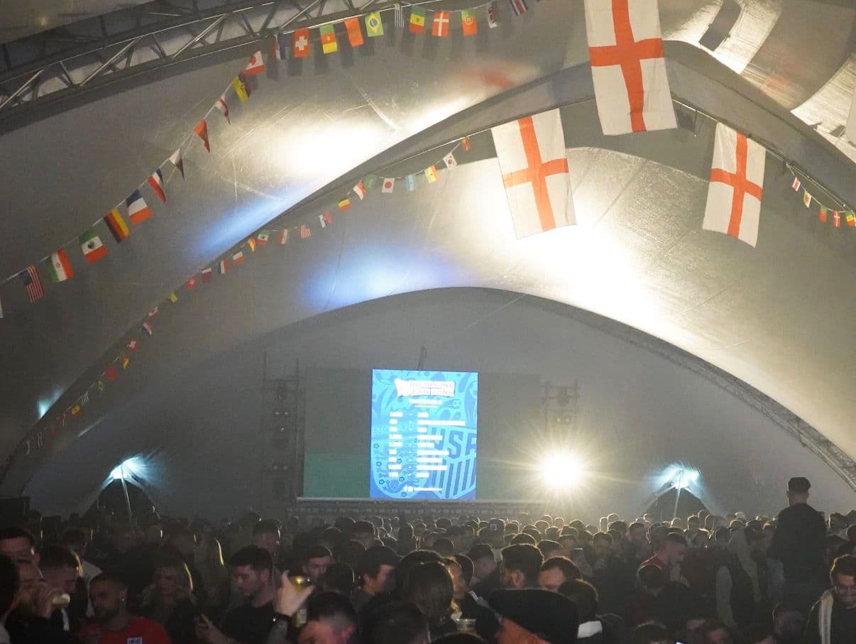 Indoor venue with flags